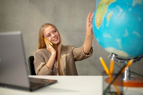 Moving Abroad, Woman Looking at Globe Deciding Where to Move