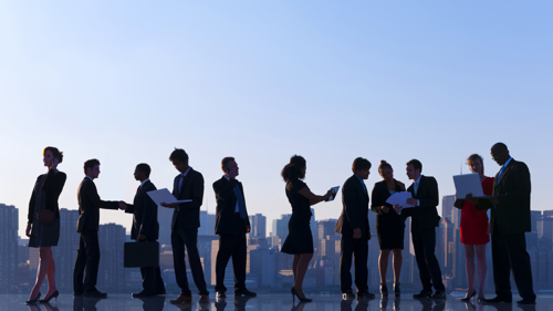 Business People with Private Health Cover Showing Etiquette